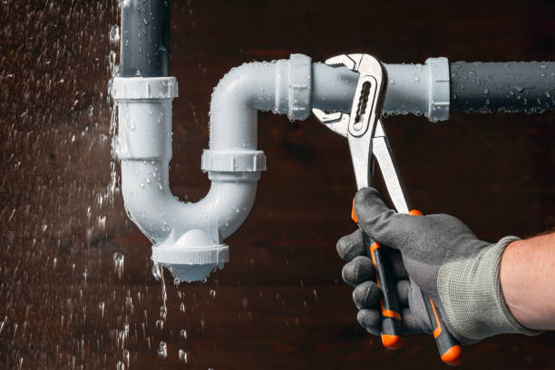 Professional Drain Cleaning technician working in Illiopolis, IL